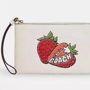 Coach NWT large corner zip wristlet with strawberry graphic
